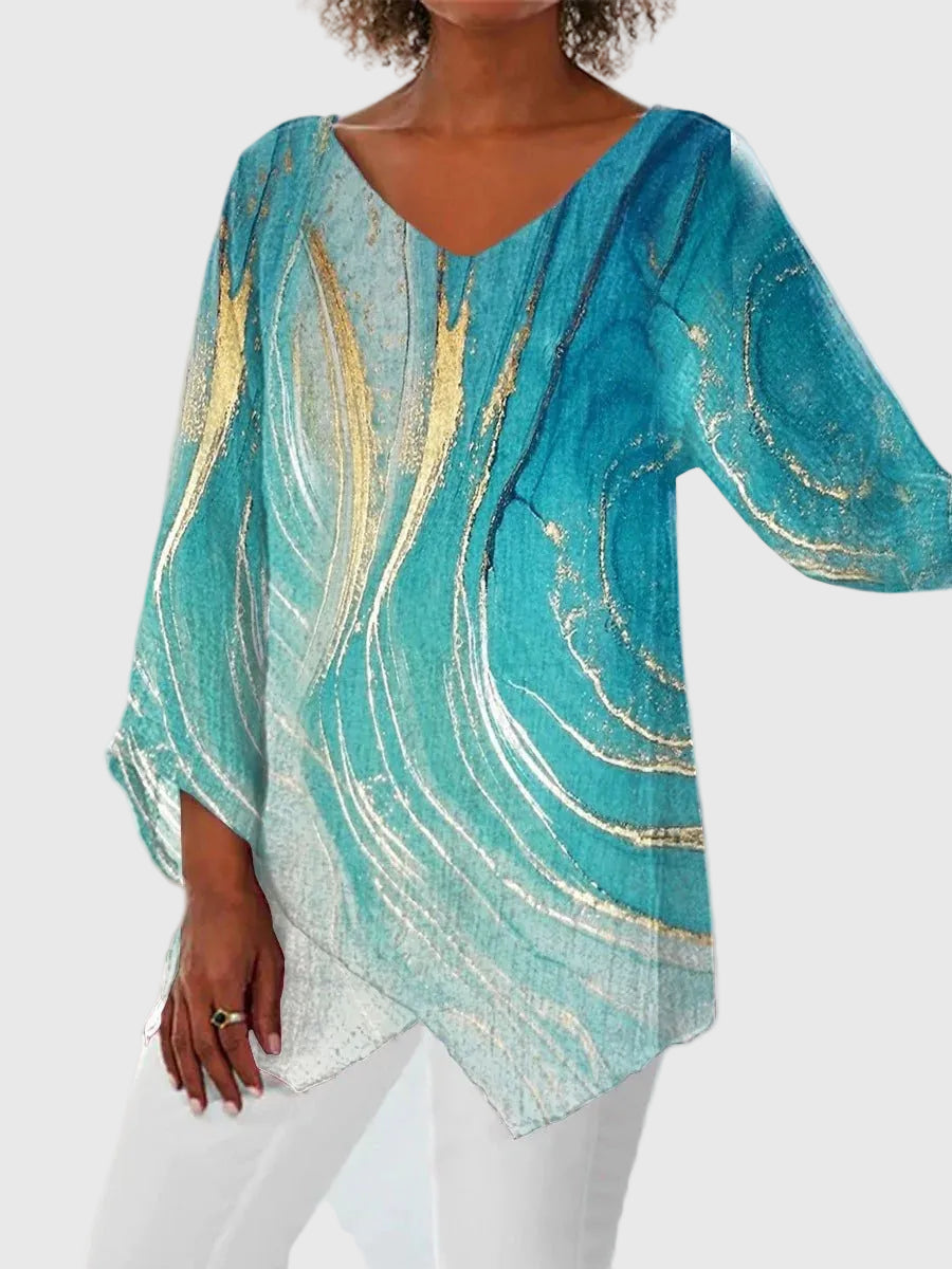 Florenz | Damen Bluse mit türkisfarbenem Druck, langen Ärmeln und asymmetrischem Saum